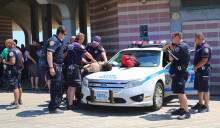BROOKLYN, NY- JUNE 15 NYPD officers providing security at Coney Island Boardwalk  in Brooklyn on June 15, 2014  The New York Police Department, established in 1845, is the largest police force in USA